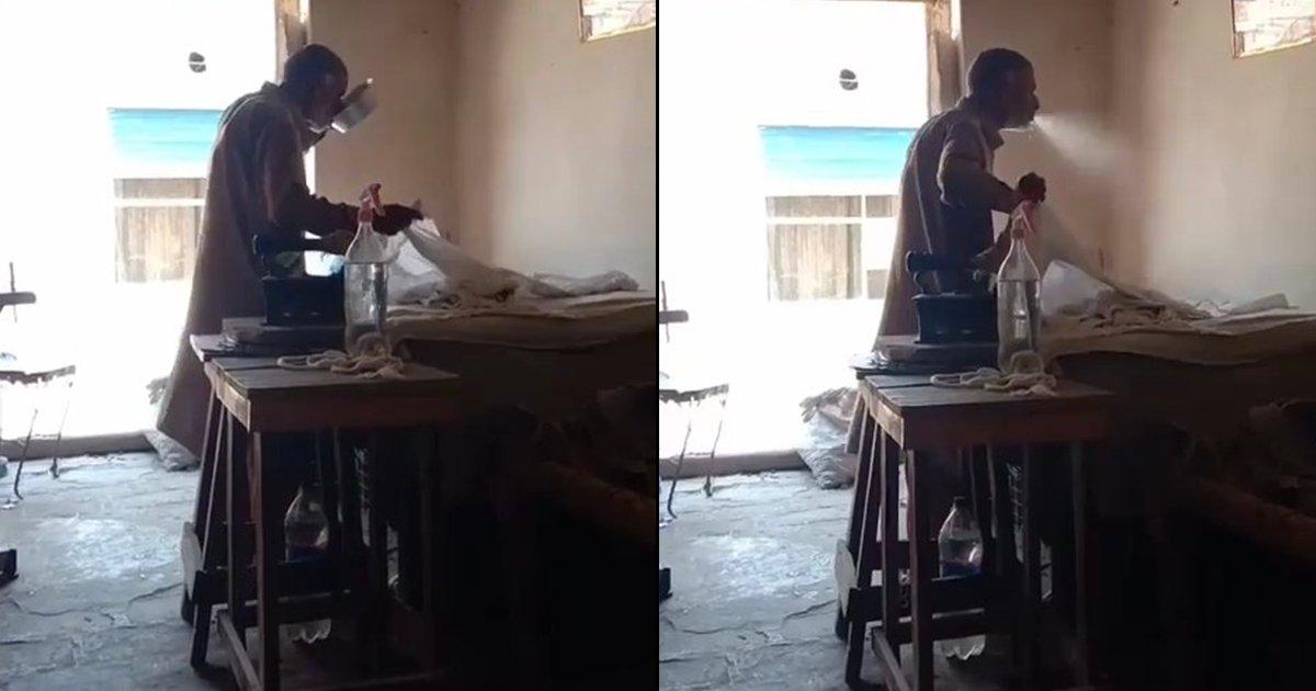 इस्तरी वाले ने Iron करने के लिए मुंह में पानी भरकर किया स्प्रे, वीडियो देख लोग दे रहे हैं गाली